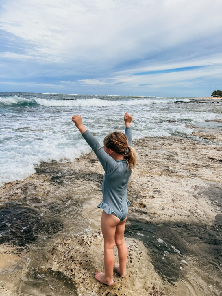 little girl on beach in Kauai