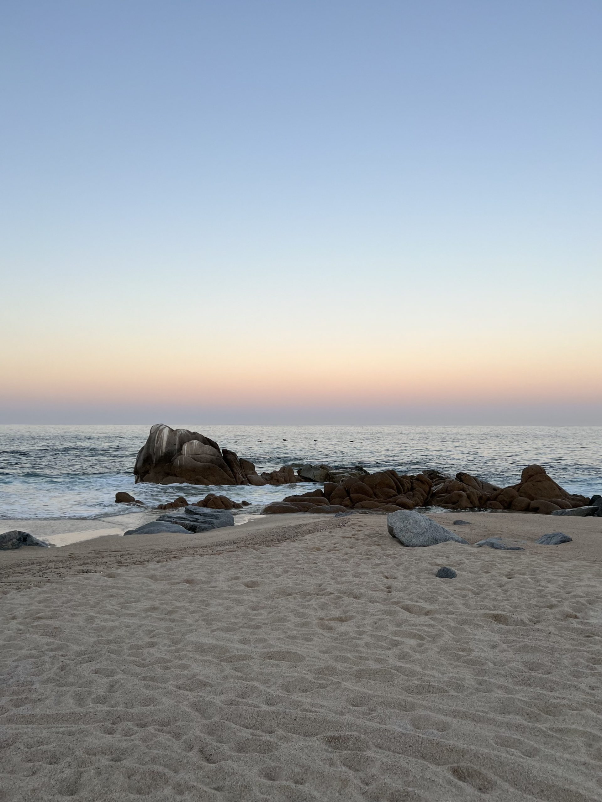 Beach in front of Hilton Los Cabos at sunset