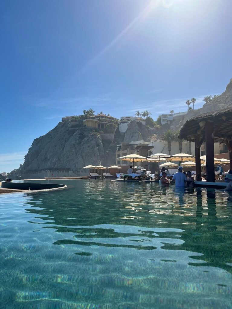 pool with swim up bar in cabo at the waldorf astoria